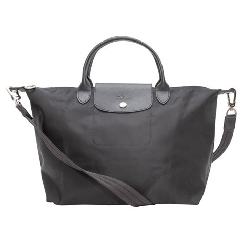 ganz schwarze longchamp tasche